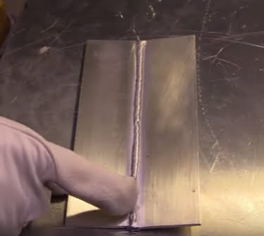 A person showing TIG work