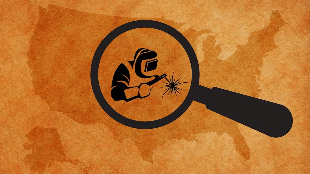 a welder's icon under the magnifying glass over the US map 