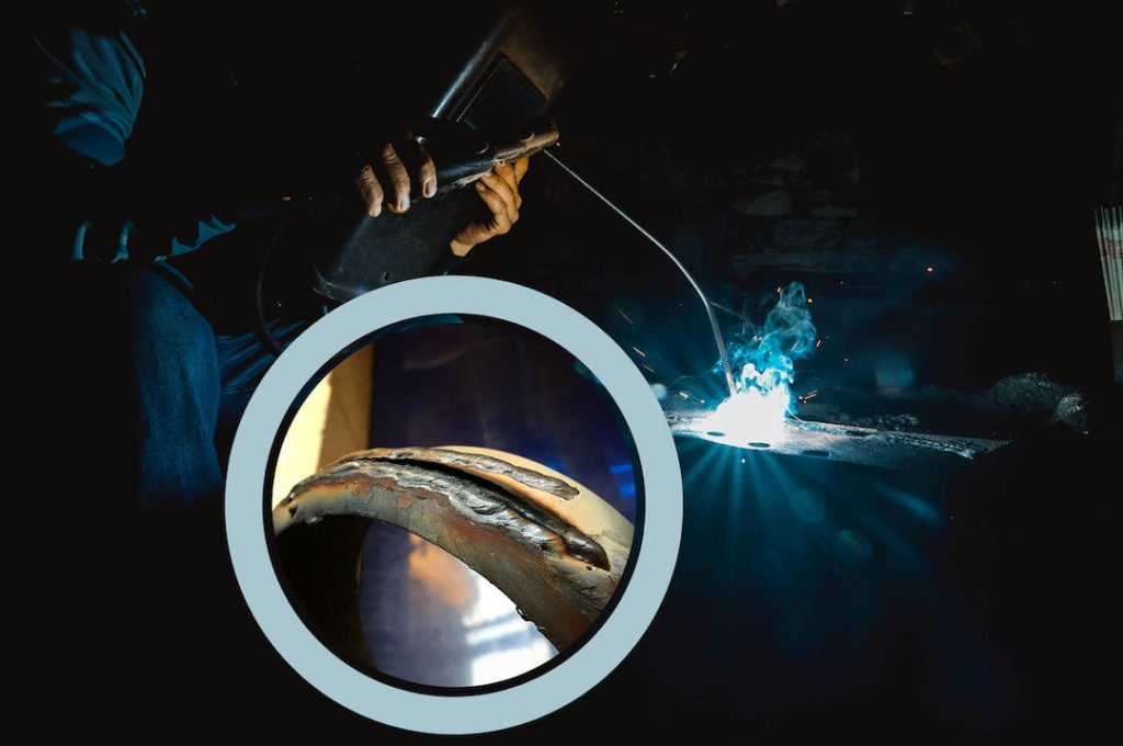 a person welding and a slag in the circle