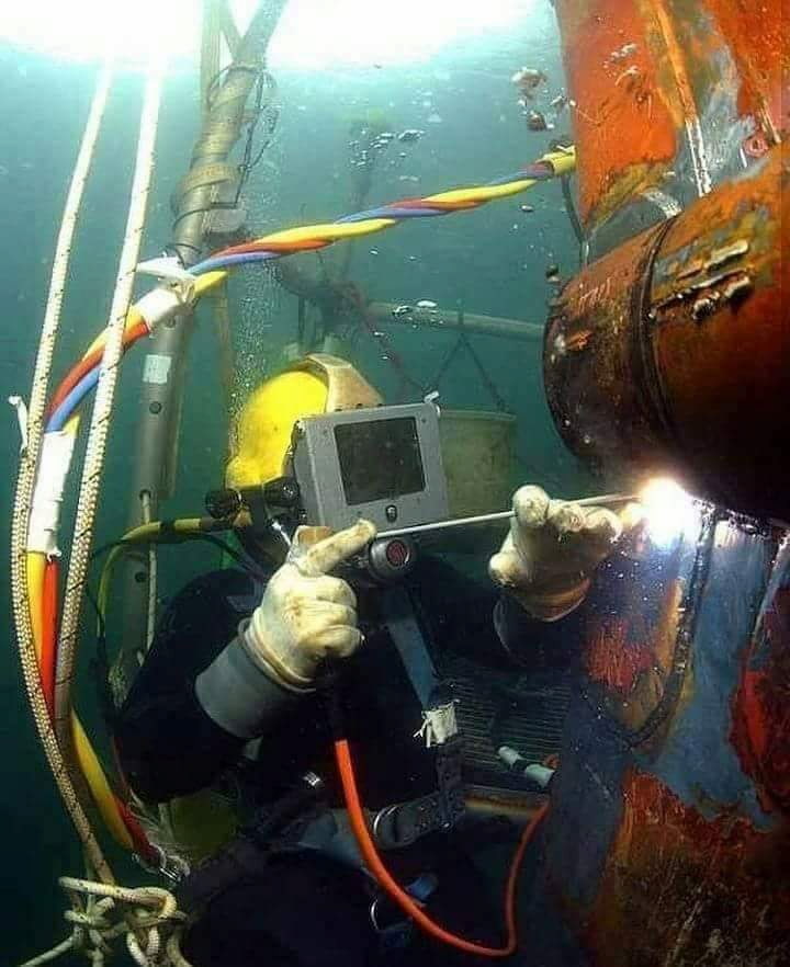 Underwater welder at work