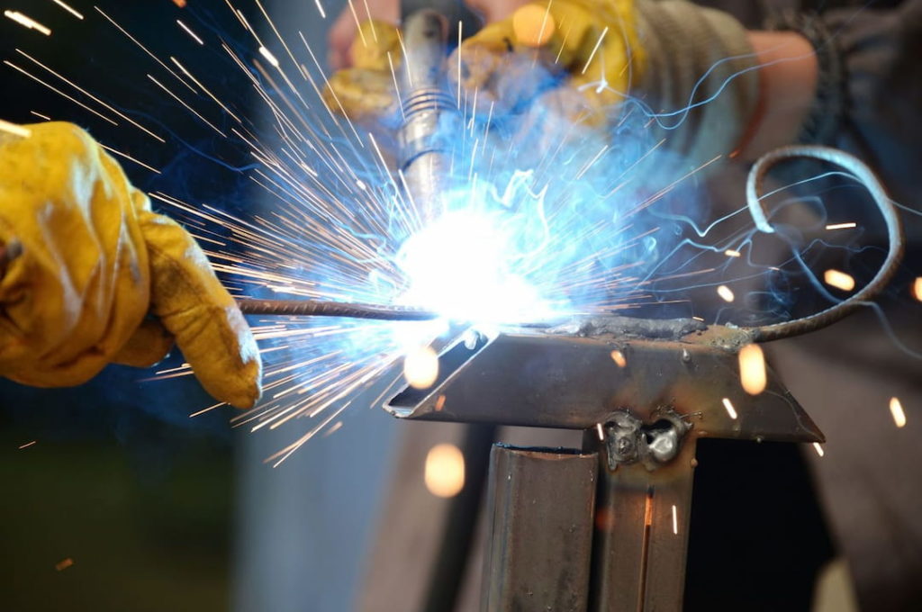 Closeup of welder's hands in work