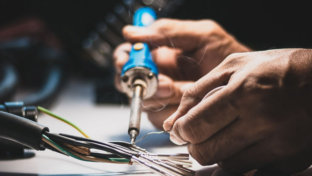 A person soldering