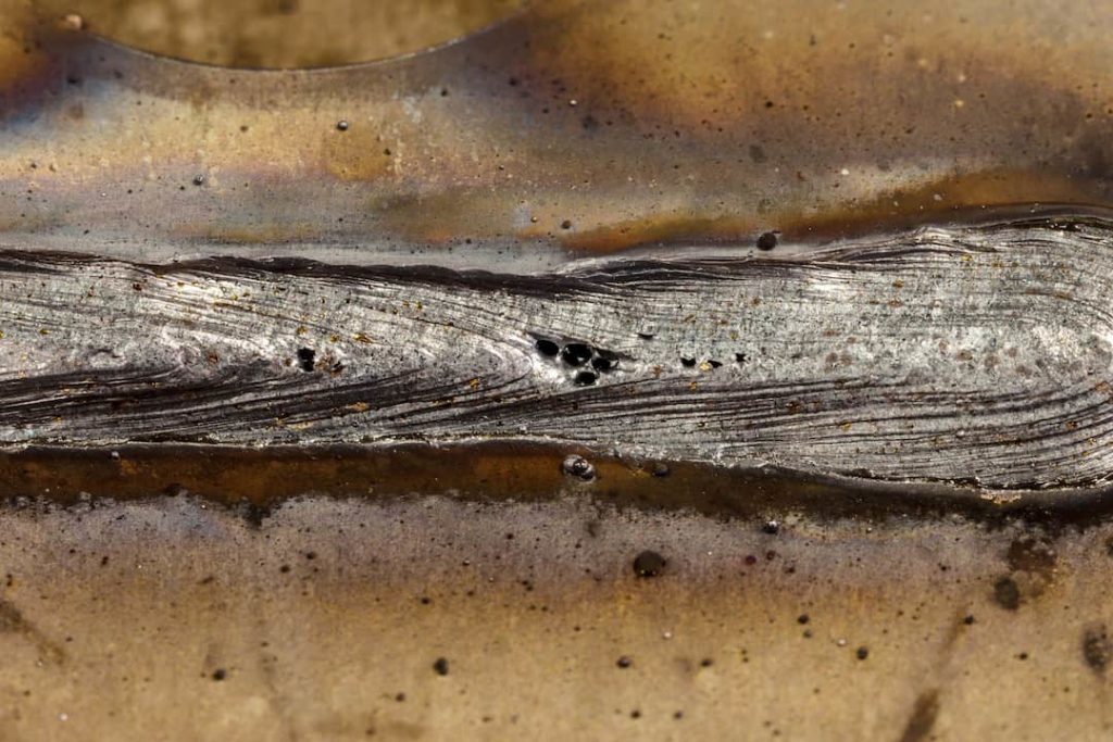 Closeup of welding porosity