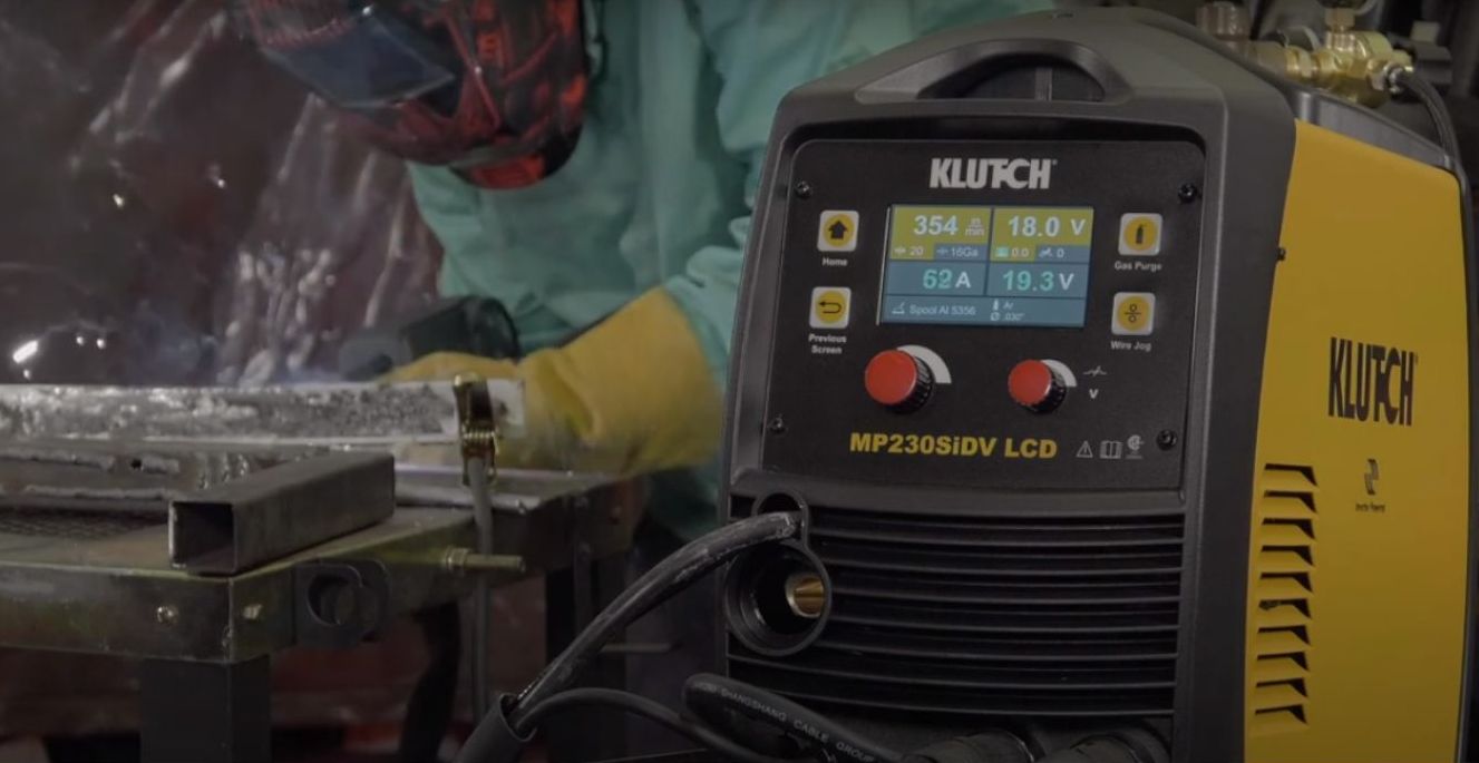 A welder working with Klutch welding machine